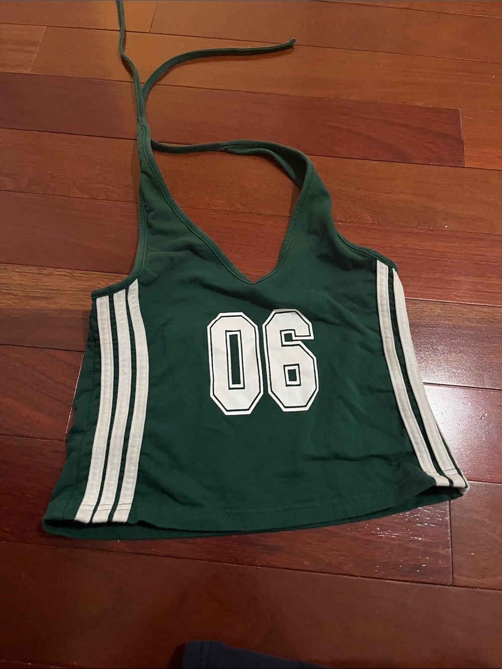 Edikted Dark Green Halter Crop Top with White Stripes and '06' Graphic